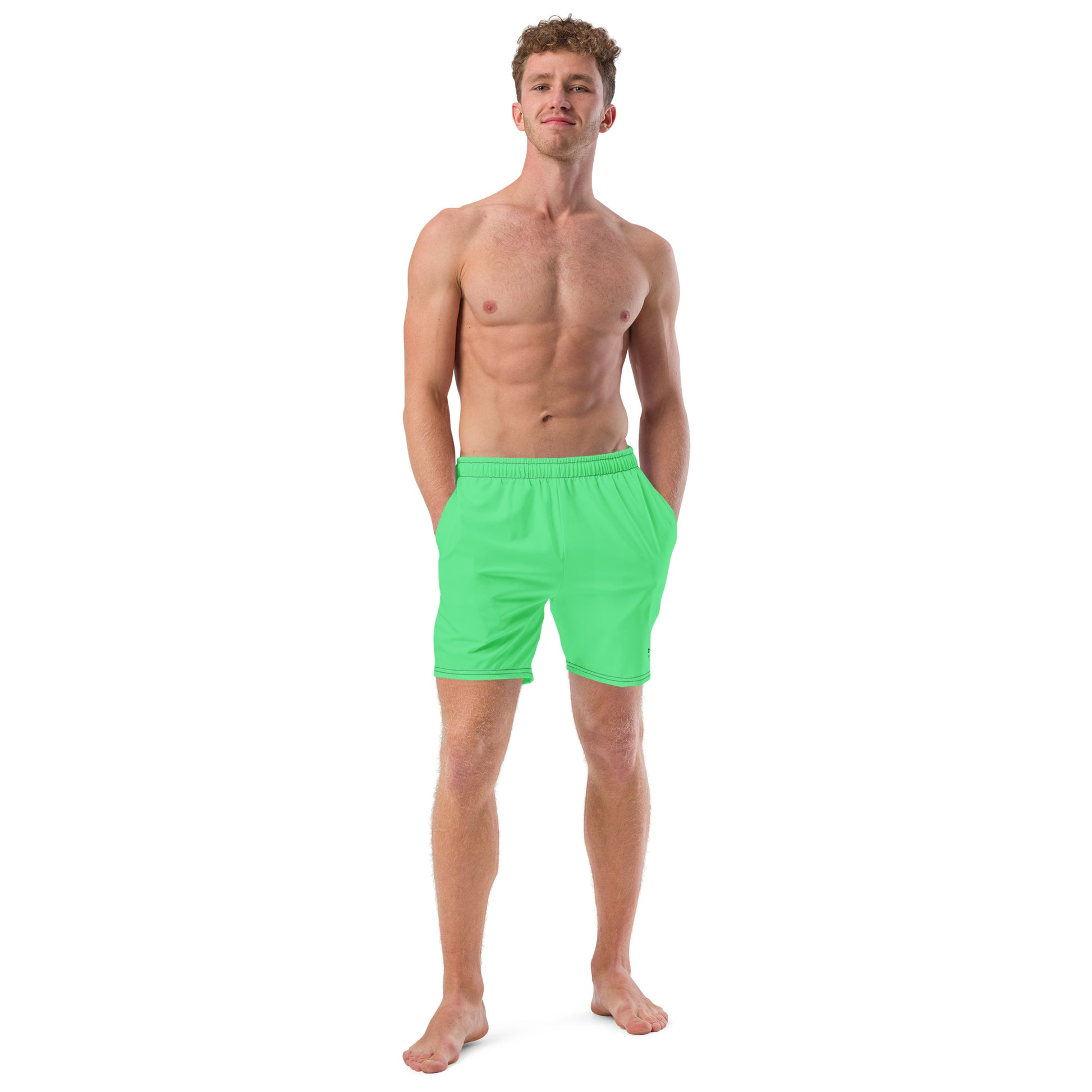 Man wearing mint-green swim trunks.