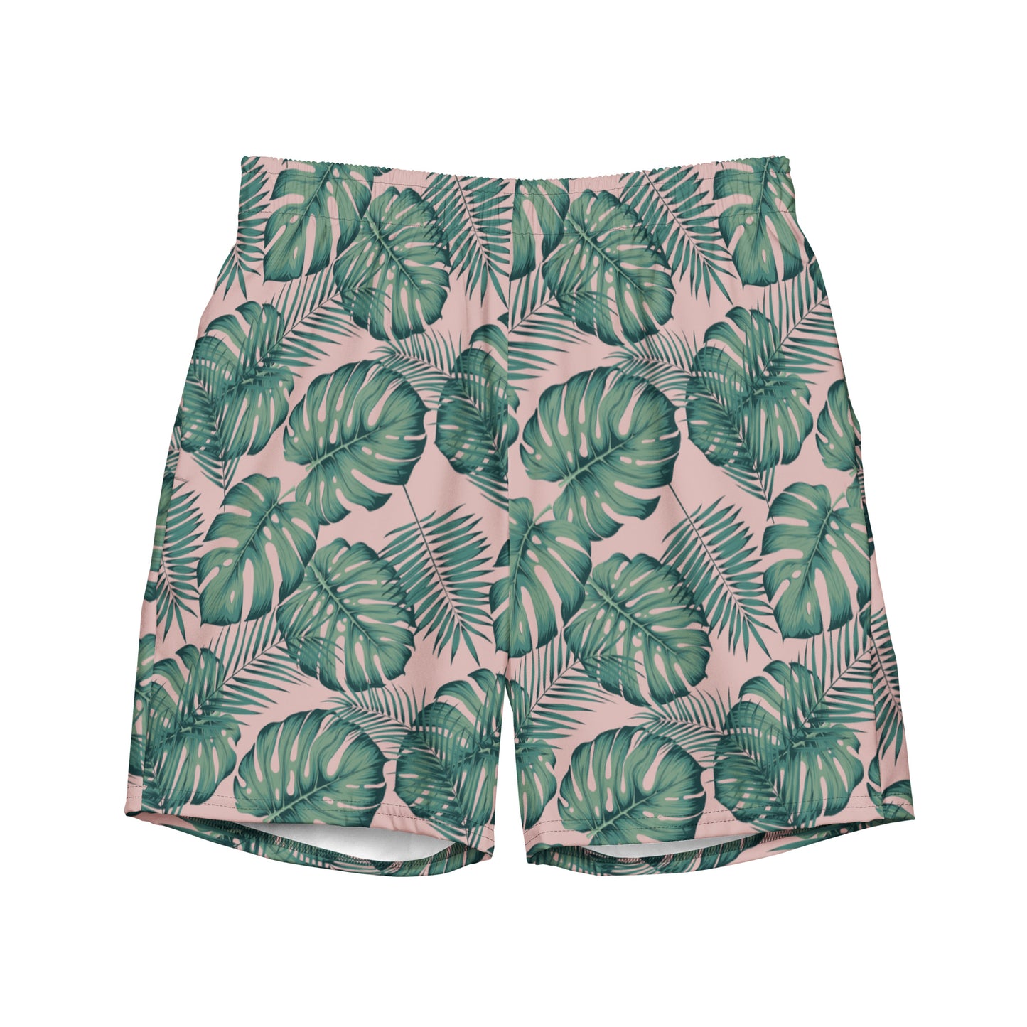 Swim trunks with pattern of green palm leaves set on a pink background.
