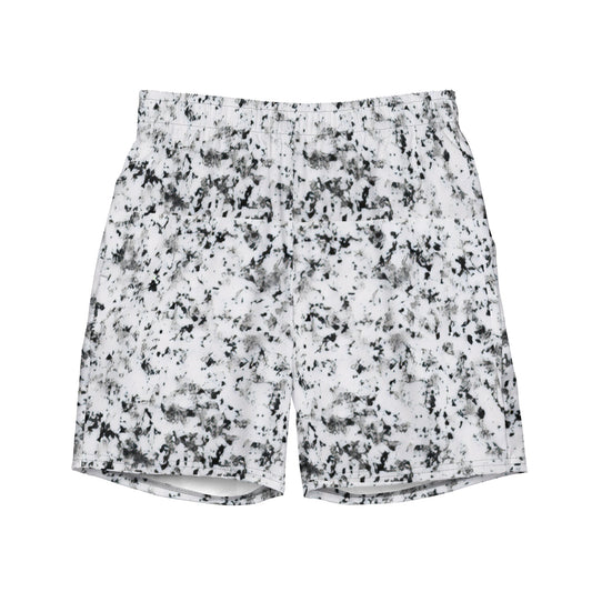 Swim trunks with pattern of black splotches on a white background.