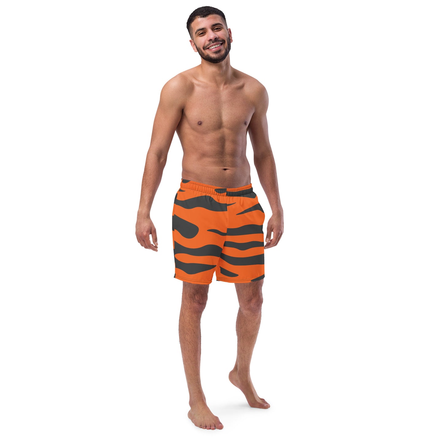 Man wearing swim trunks with tiger-skin pattern.
