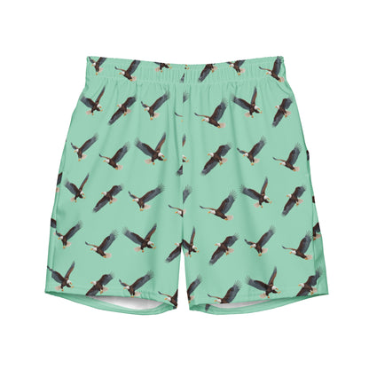 Green swim trunks with pattern of bald eagles.