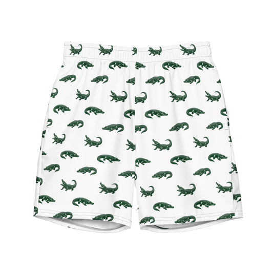 White swim trunks with pattern of green alligators.