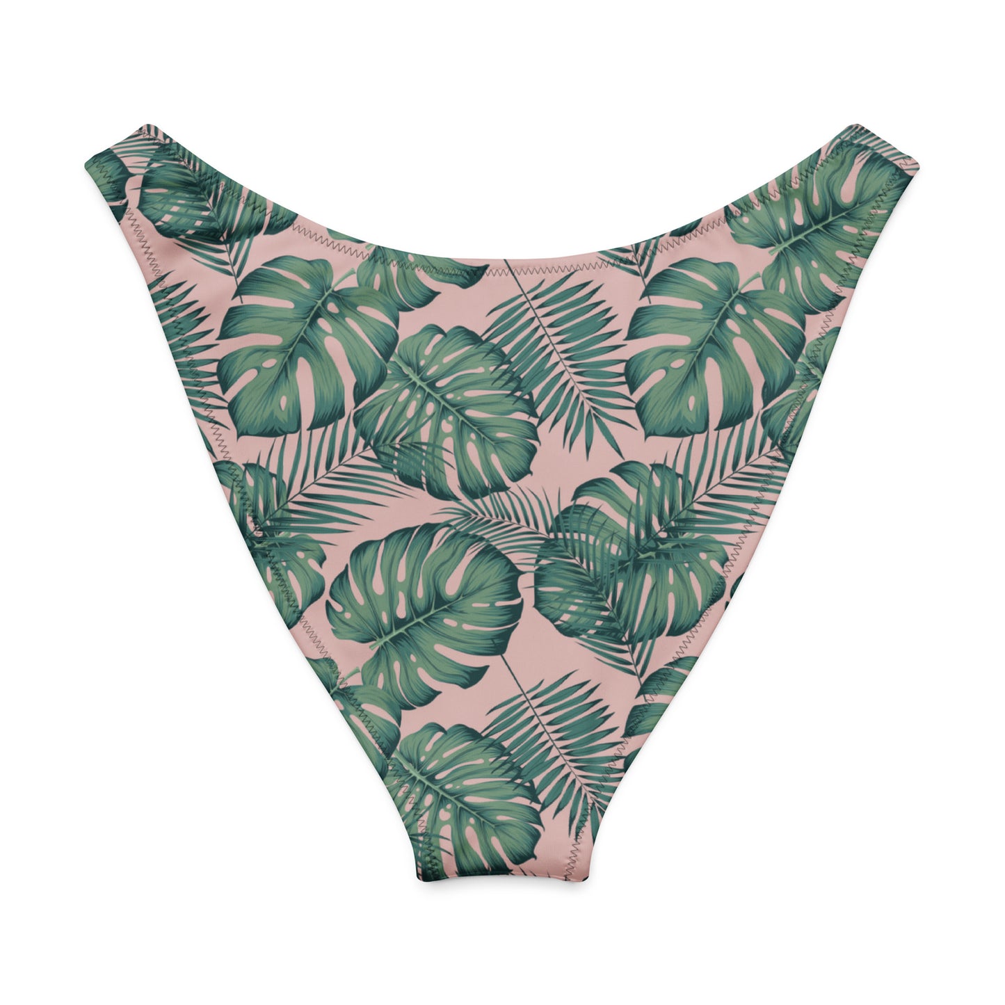 Back of bikini bottom with design of green palm leaves set on a pink background.