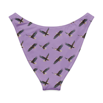 Purple bikini bottom with pattern of bald eagles.
