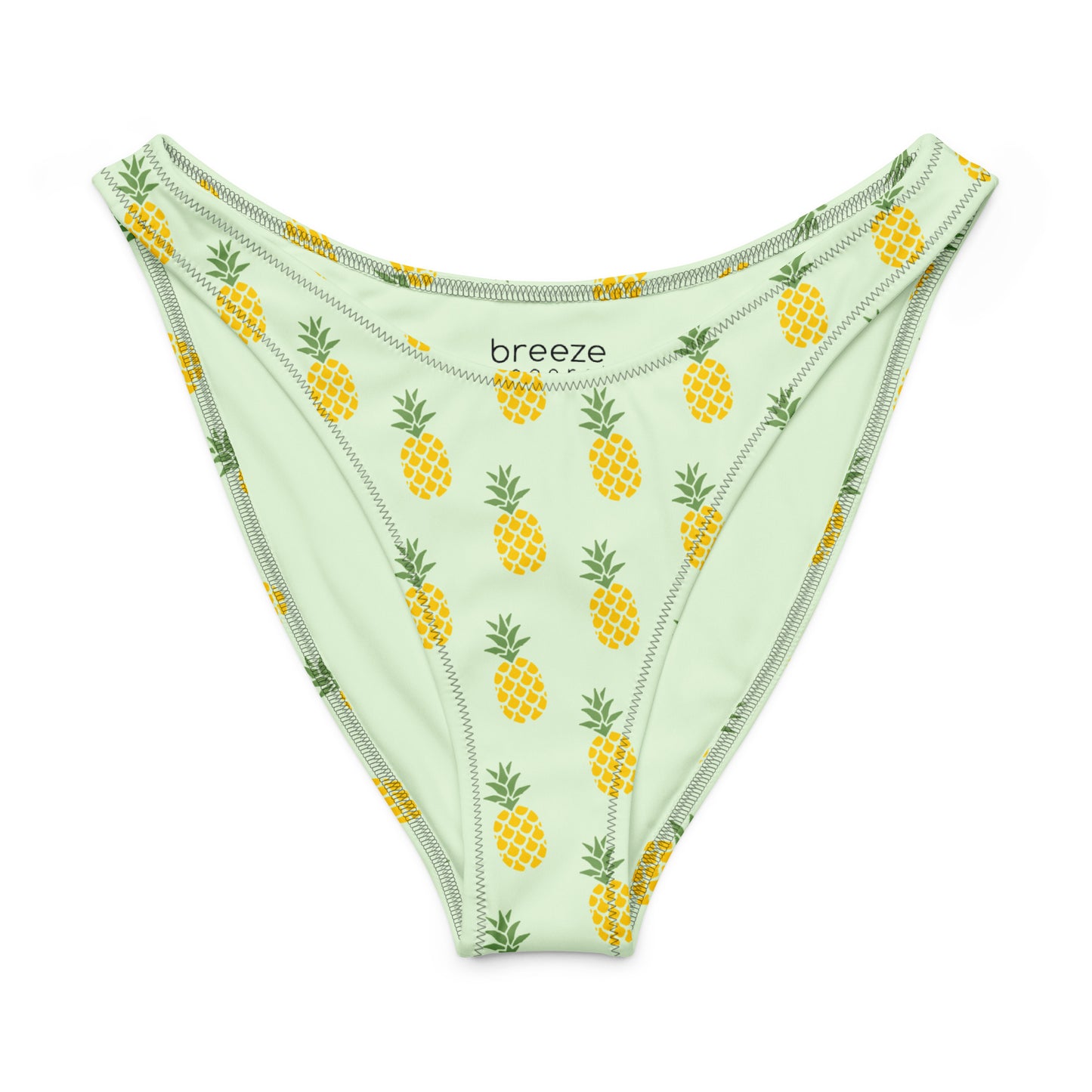 Bikini bottom with an all-over pineapple design set on a light-green background.