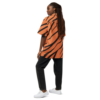 Rear view of woman wearing button-down shirt with tigerskin pattern.