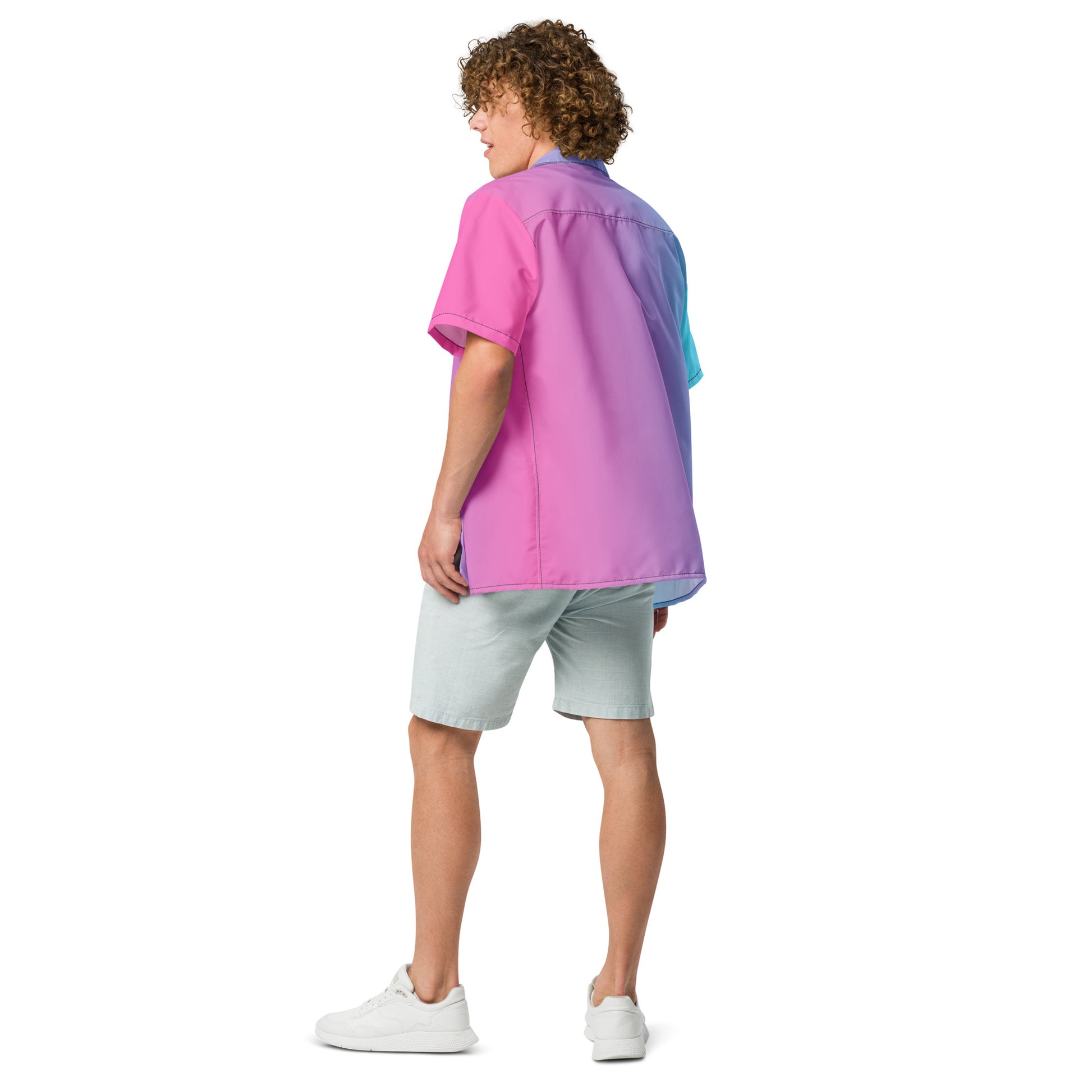 Rear view of man wearing button-down shirt with color scheme that fades from light blue, to purple, to pink.