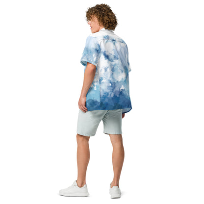 Rear view of man wearing button-down shirt with blue-white pattern resembling watercolor.