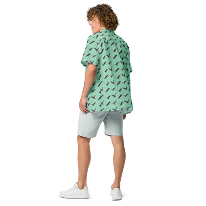 Man wearing green button-down shirt with pattern of bald eagles.