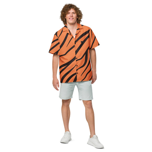 Man wearing button-down shirt with tigerskin pattern.