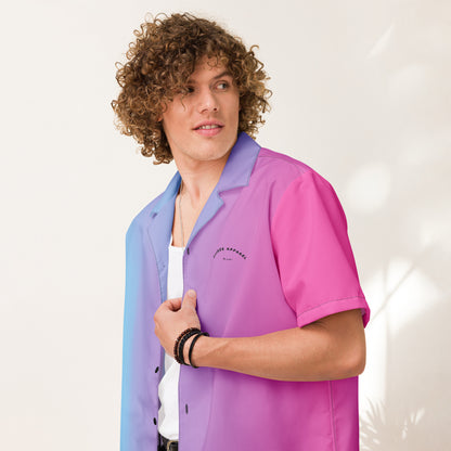 Man wearing button-down shirt with color scheme that fades from light blue, to purple, to pink.