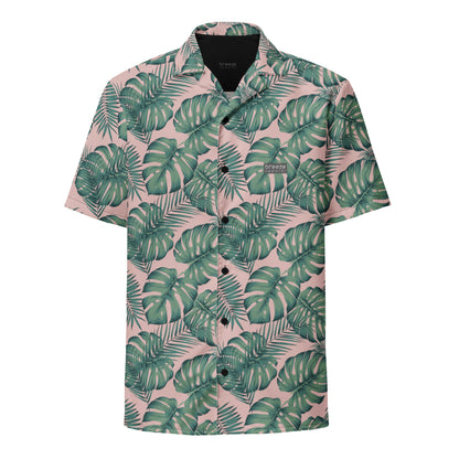Button-down shirt with pattern of green palm leaves set on a pink background.