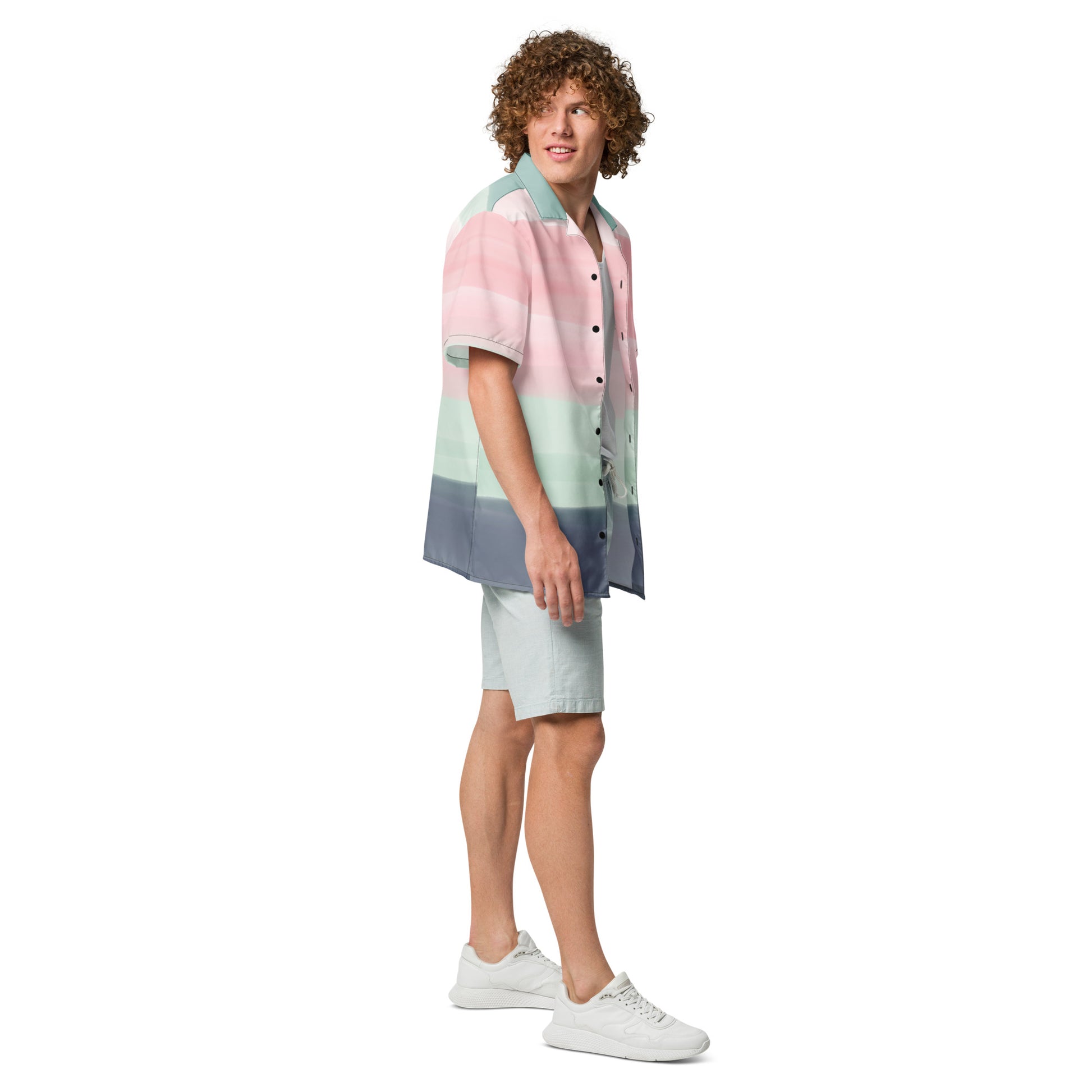 Man wearing button-down shirt with pattern of horizontal stripes that are a shade of pink, mint green, or gray, resembling a watercolor design.