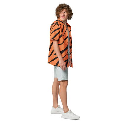 Man wearing button-down shirt with tigerskin pattern.