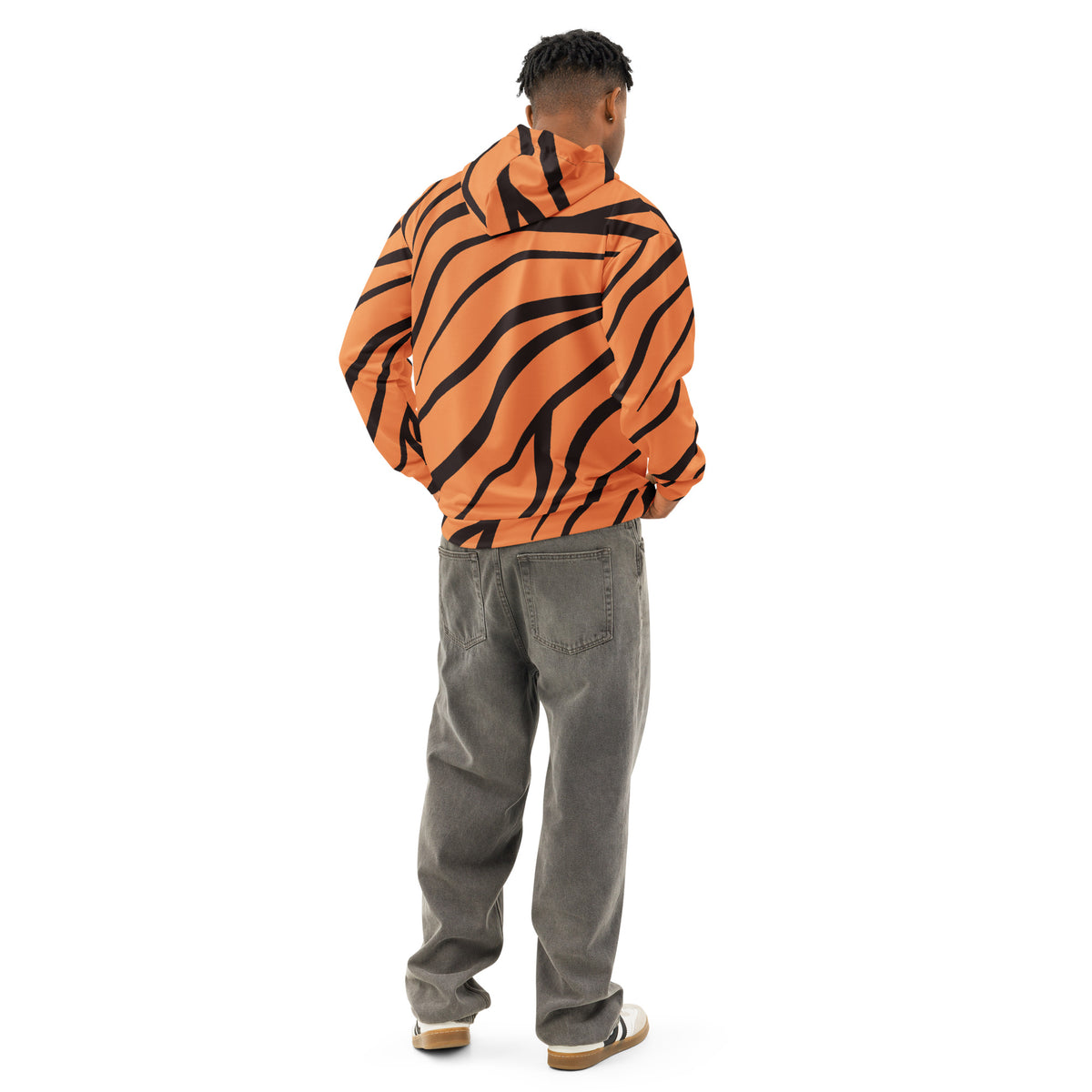 Rear view of man wearing hoodie with a tiger-print design