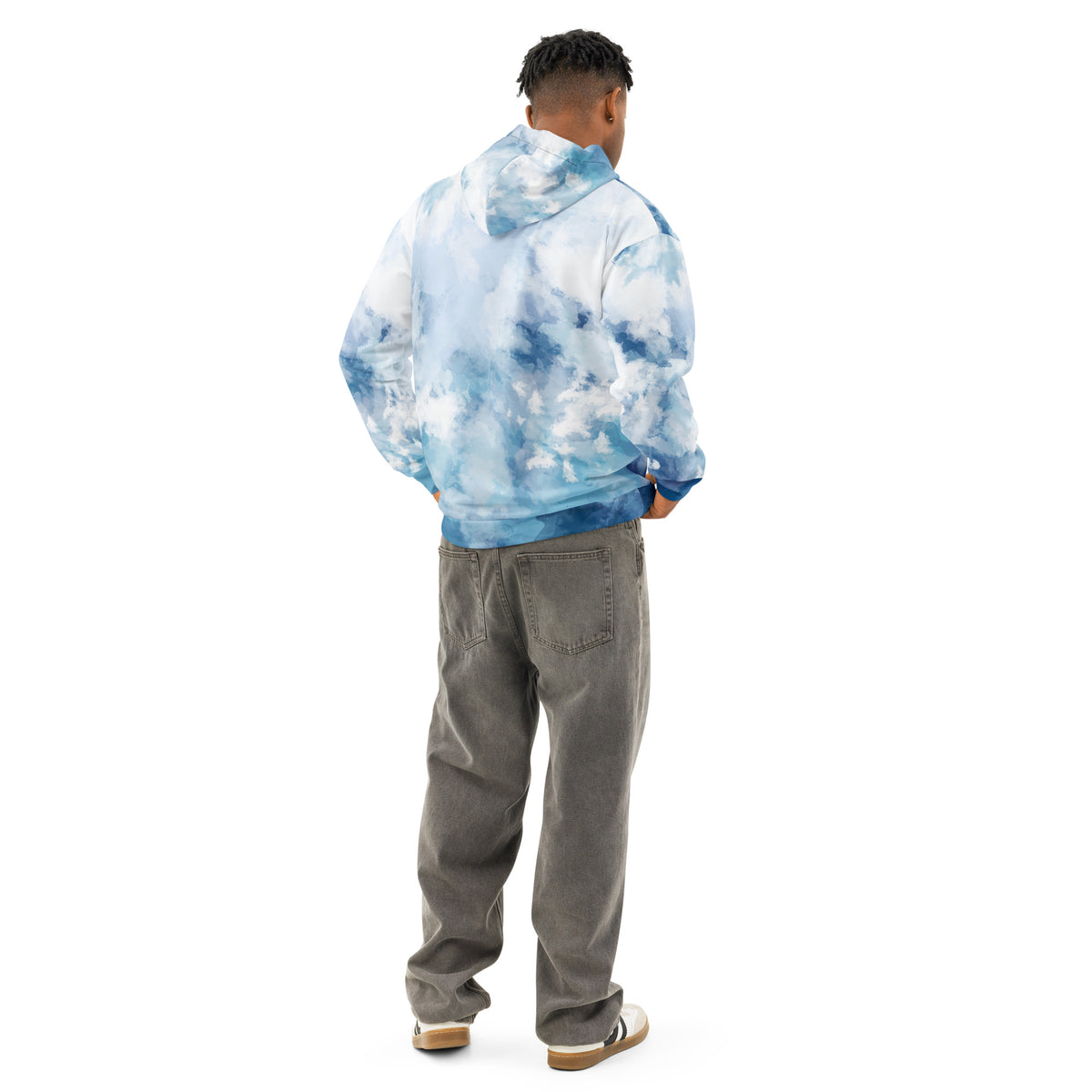 Rear view of man wearing hoodie with a blue watercolor-style design.