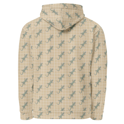 Back of beige hoodie with pattern of green geckos.