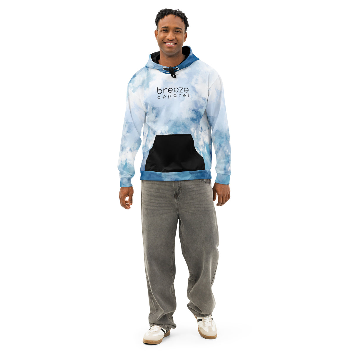 Man wearing hoodie with a blue watercolor-style design, black pocket, black drawstrings, and a black 'breeze apparel' logo on the chest.