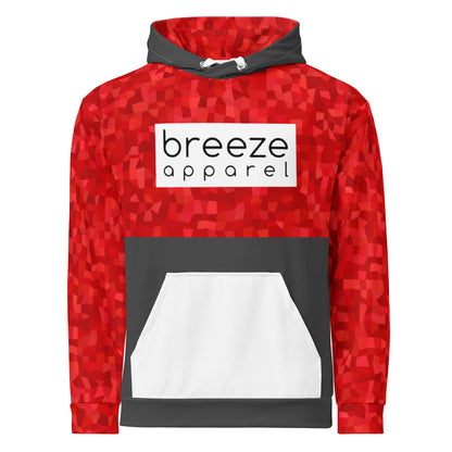 Hoodie with a red geometric pattern on upper half, sleeves and hood interior, with a white pocket, white drawstrings tucked inside, and a 'breeze apparel' logo consisting of black wording set in a white rectangle across the chest. Behind pocket and on outside of hood is dark gray.