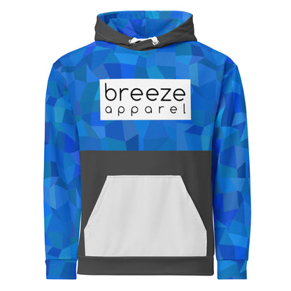 Hoodie with blue geometric pattern on top half, hood interior, and sleeves, a white box with 'breeze apparel' in black inside across chest, a light-gray pocket. Drawstrings are white, while hood and bottom half are dark gray.