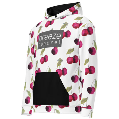 White hoodie with an all-over cherries design. Across the chest is a gray rectangle with 'breeze apparel' in white inside. Hood interior, drawstrings, and pocket are black.