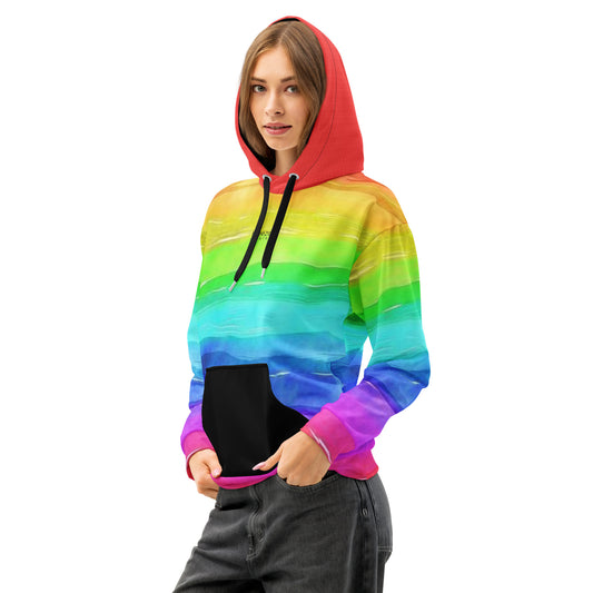 Woman wearing hoodie with rainbow color scheme resembling watercolor.