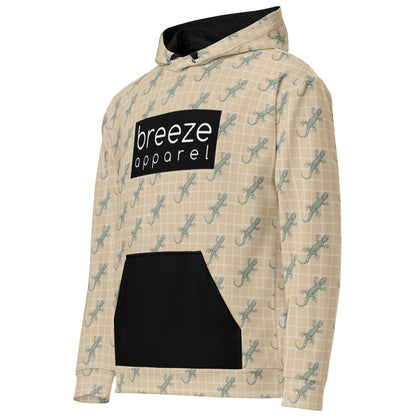 Beige hoodie with pattern of green geckos and black, rectangular logo with white lettering across chest. Hood interior, drawstrings, and pocket are black.