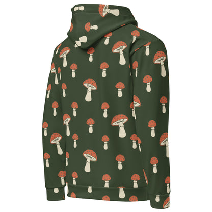 Backside of forest-green hoodie with all-over mushroom pattern