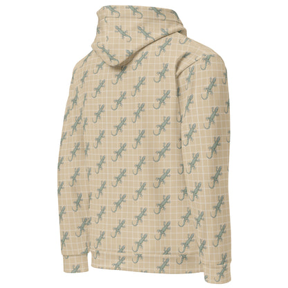 Back of beige hoodie with pattern of green geckos.