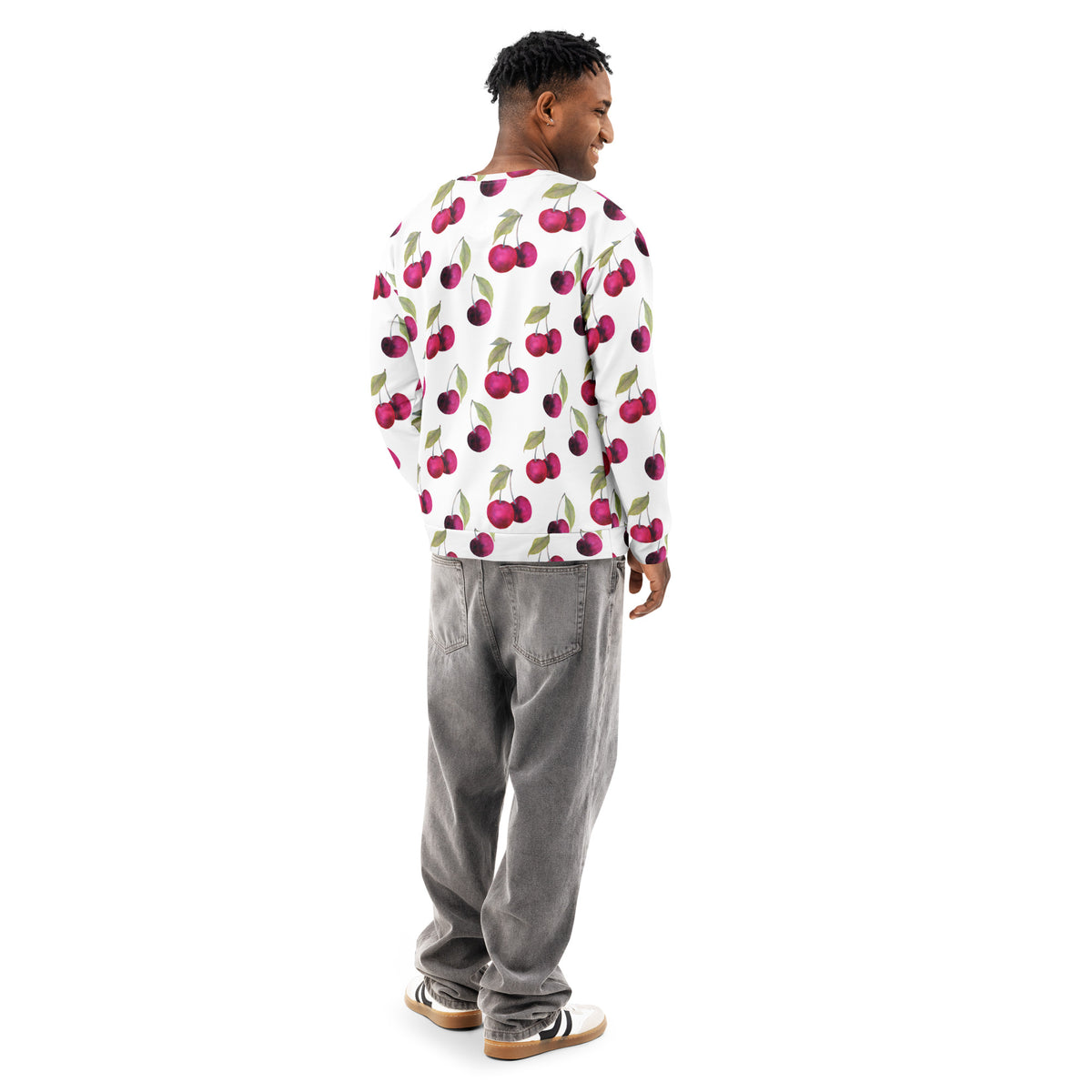 Rear view of man wearing a white sweatshirt with an all-over cherries design.