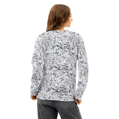 Rear view of a woman wearing a white sweatshirt with black splotches, resembling a marble countertop. Across the chest is a black rectangle with 'breeze apparel' written in white.