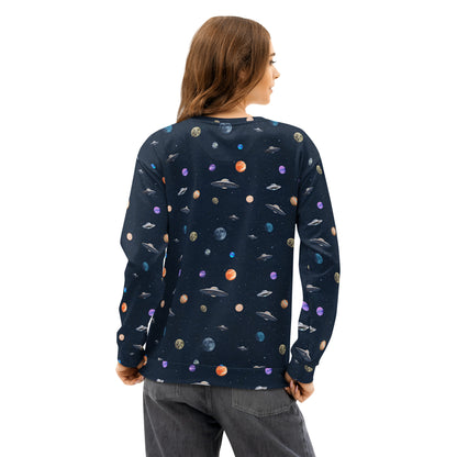 Rear view of woman wearing sweatshirt with pattern of UFOs and planets in space.