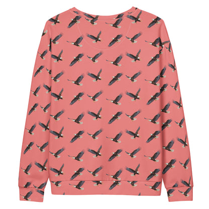 Red sweatshirt with pattern of bald eagles.