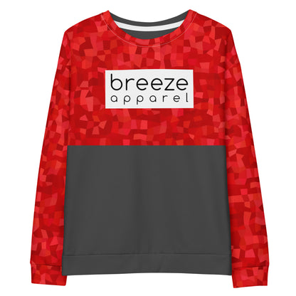 Sweatshirt with a red geometric pattern on upper half and sleeves, with a 'breeze apparel' logo in black inside a white rectangle across the chest. Bottom half is dark gray.