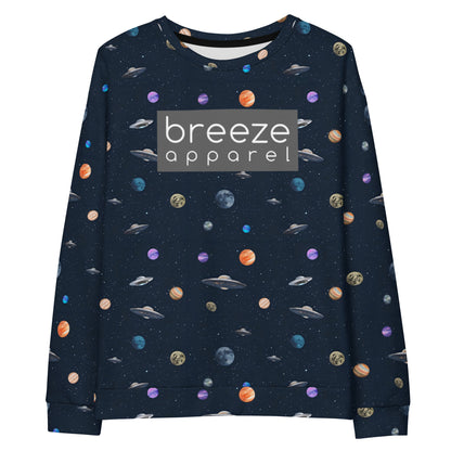 Sweatshirt with pattern of UFOs and planets in space. Chest is overlaid with gray, rectangular logo with white lettering.