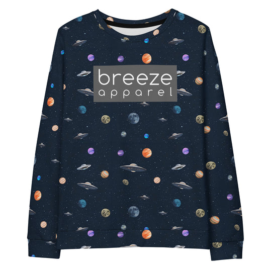 Sweatshirt with pattern of UFOs and planets in space. Chest is overlaid with gray, rectangular logo with white lettering.