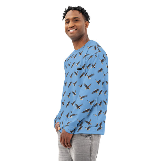 Man wearing blue sweatshirt with pattern of bald eagles.