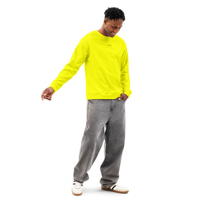 Man wearing yellow sweatshirt with 'breeze apparel' in small, black text on chest.