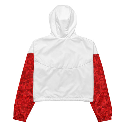 White back of cropped jacket. Sleeves have red geometric pattern.
