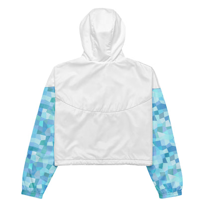 White back of cropped jacket; sleeves have light-blue geometric pattern.