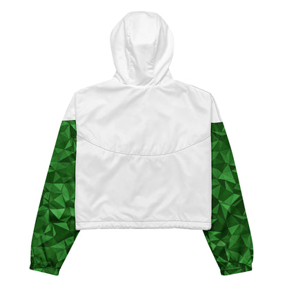 White back of cropped windbreaker; sleeves have green geometric pattern.
