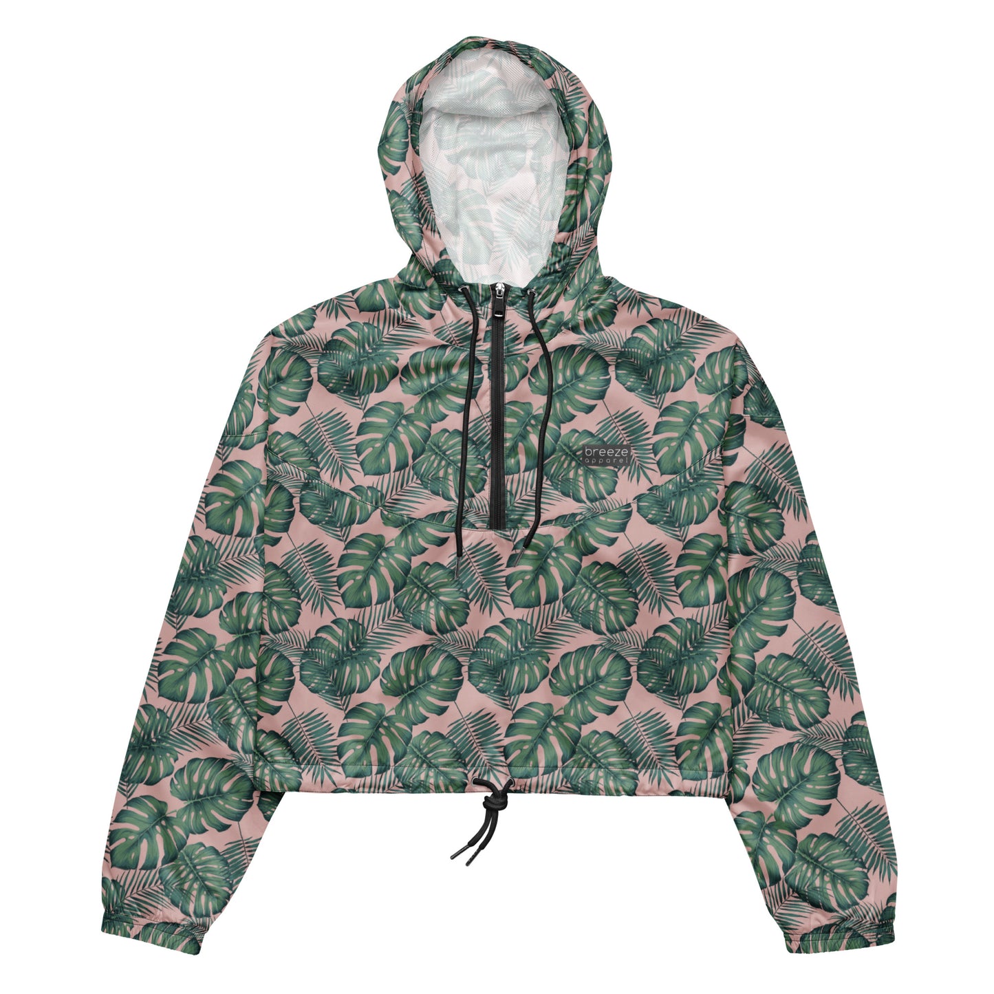 Cropped jacket with pattern of green palm leaves set on a pink background.