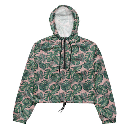 Cropped jacket with pattern of green palm leaves set on a pink background.