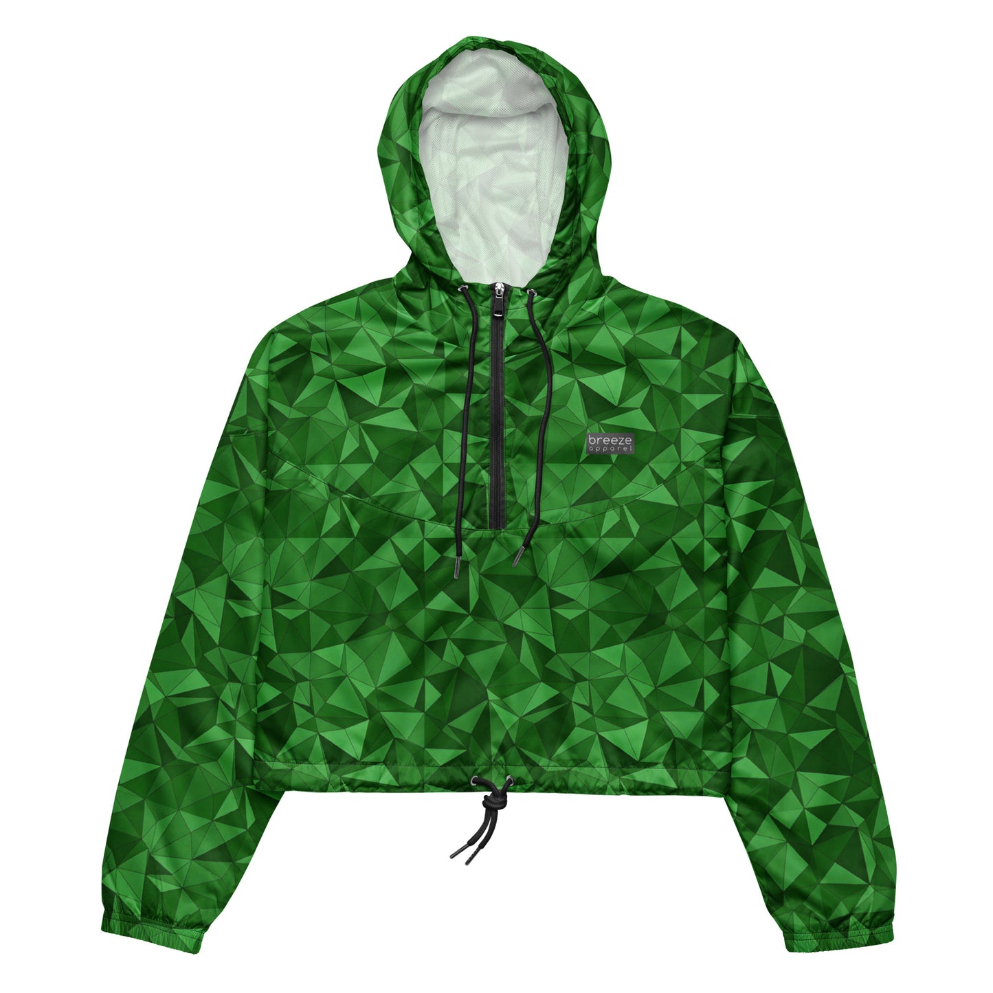 Cropped windbreaker with green geometric pattern.