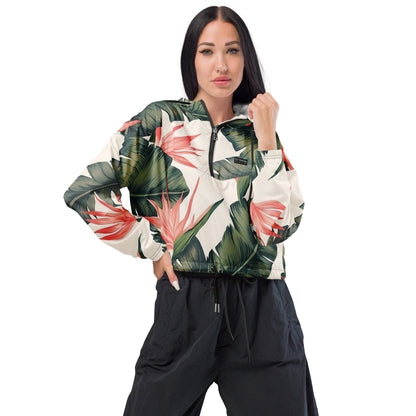 Woman wearing cropped windbreaker with tropical floral design.