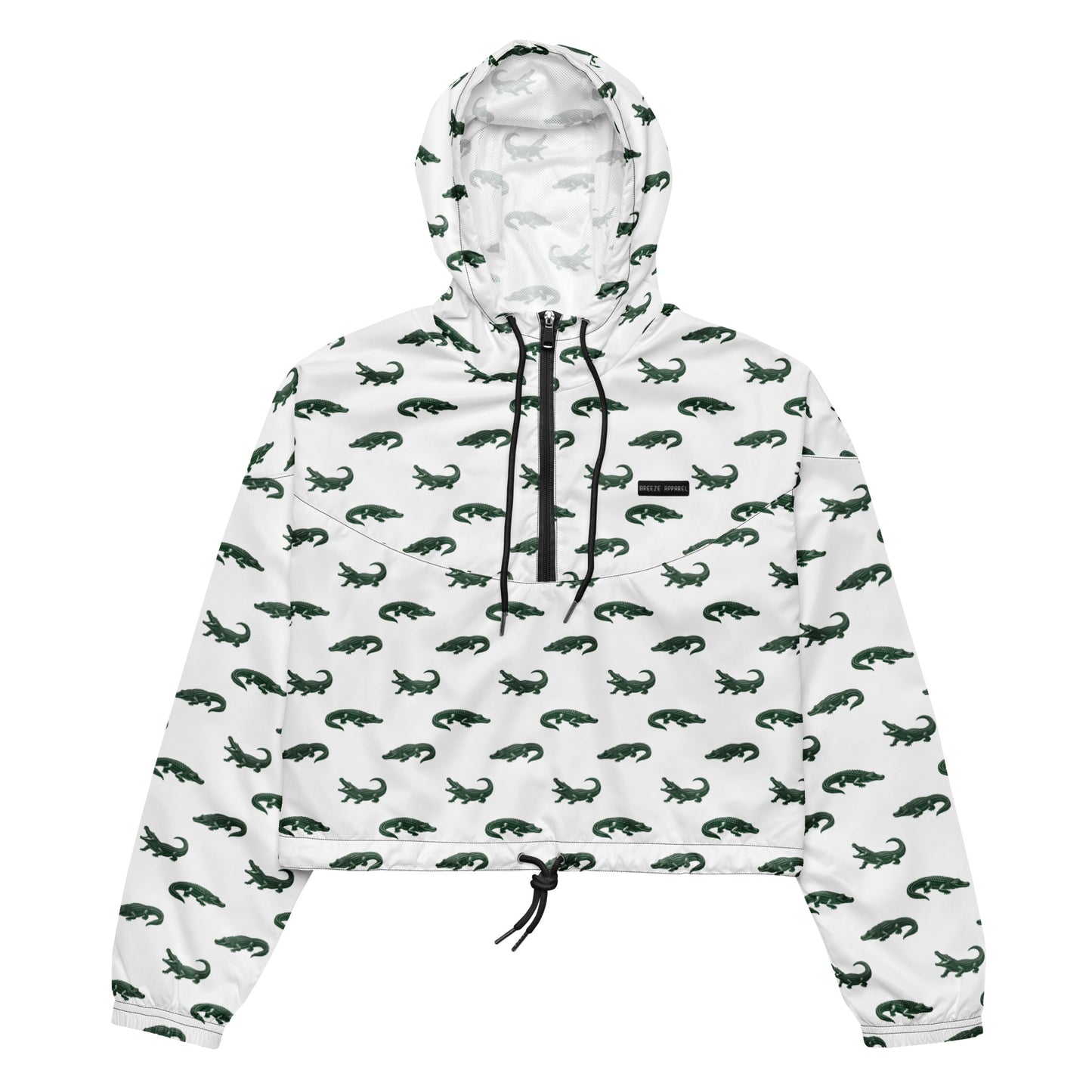 White, cropped windbreaker with pattern of green alligators.