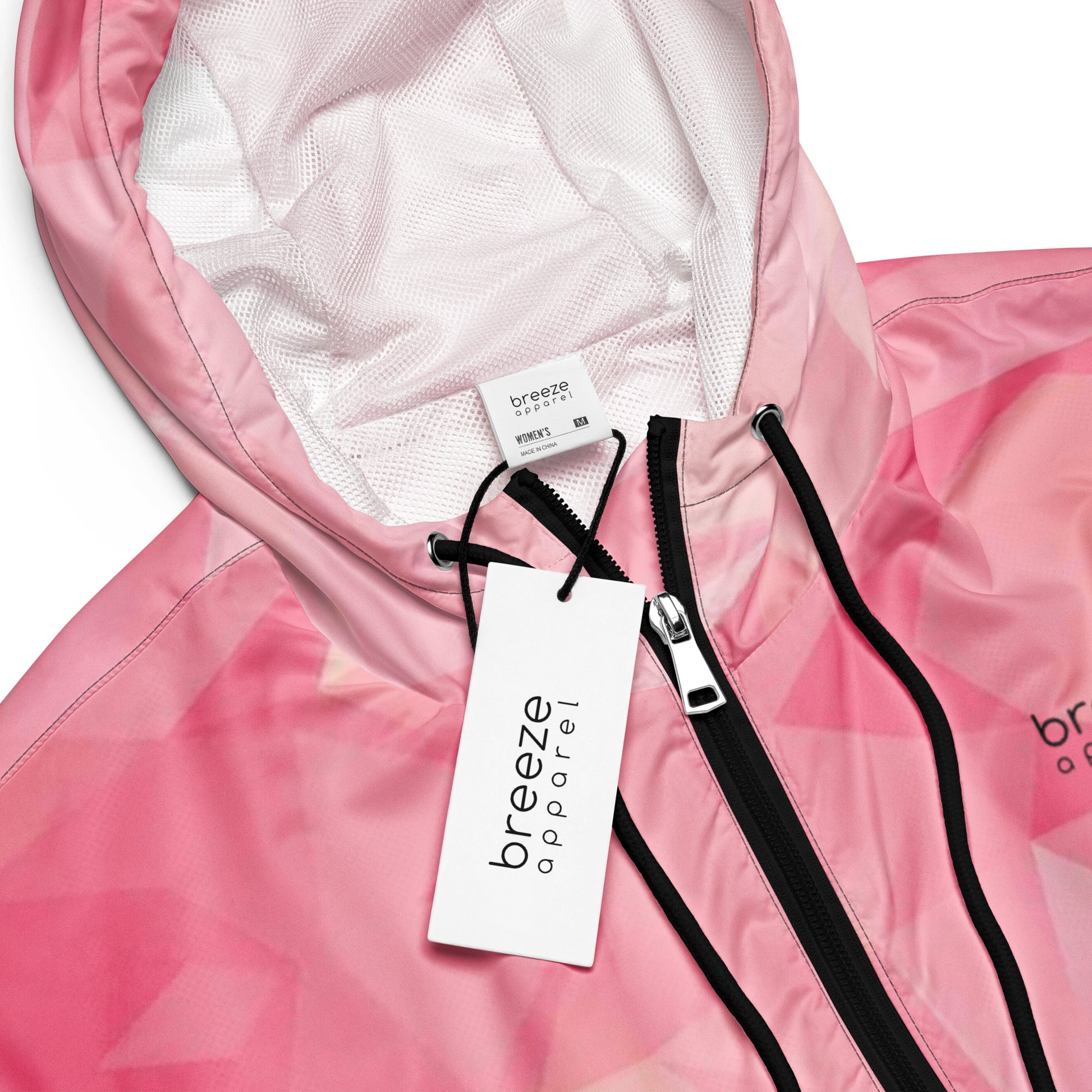 Jacket with pink geometric pattern.