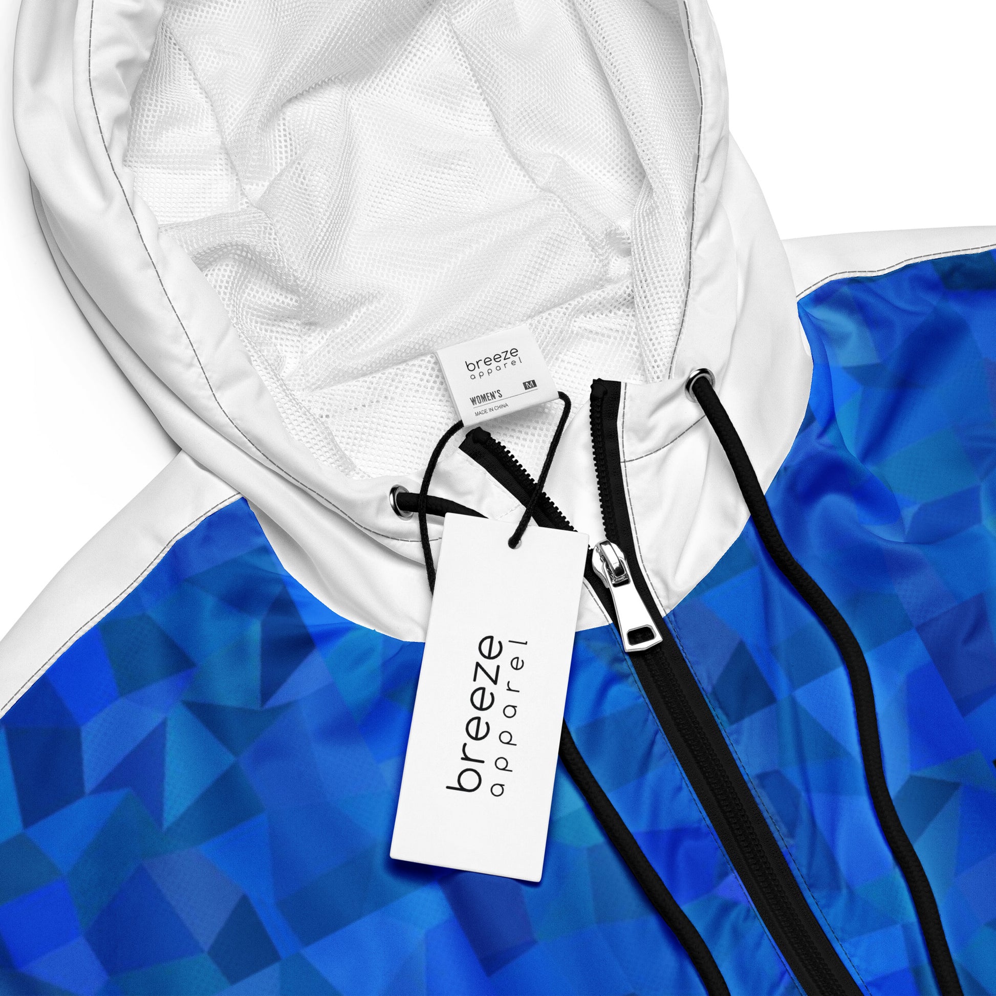 Jacket with blue geometric pattern.