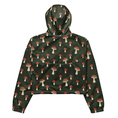 Cropped jacket with pattern of mushrooms set on a green background.
