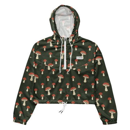 Cropped jacket with pattern of mushrooms set on a green background.